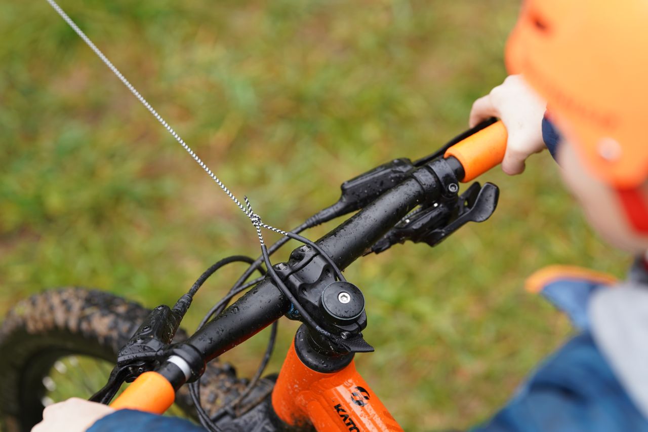 Kommit Fahrrad Zugsystem Kinder Abschleppseil schwarz/orange