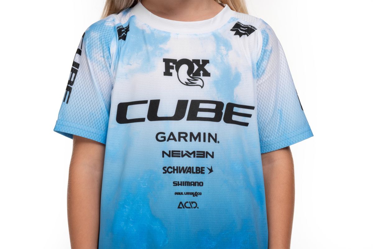 Cube Rookie X Actionteam Kinder Fahrrad Trikot kurz topas blau/weiß 2026